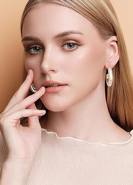 Modern Sculptural Gold Hoop Earrings